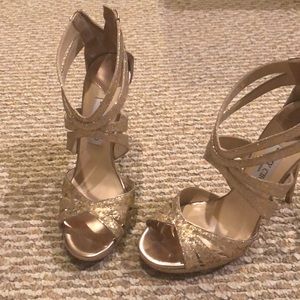 Gorgeous Jimmy Choo. Never worn. Fits like a 8.5.